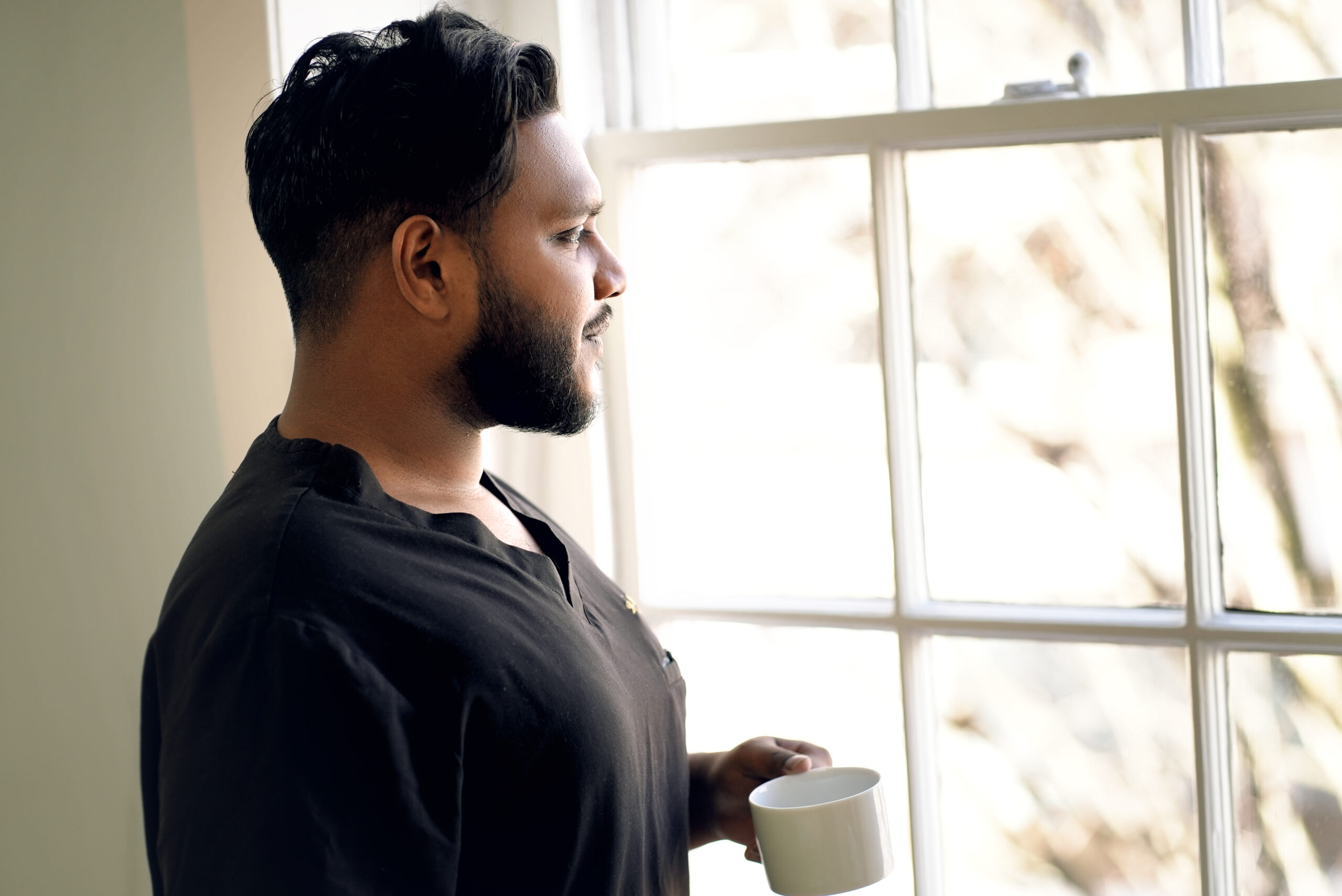 Dr Manish Mittal, hair transplant surgeon, at his London clinic